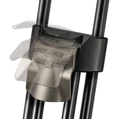 Close-up of a Quick Lock bicycle wheel lock attached to black metal spokes, with a translucent protective cover partially slid off, on a white background.